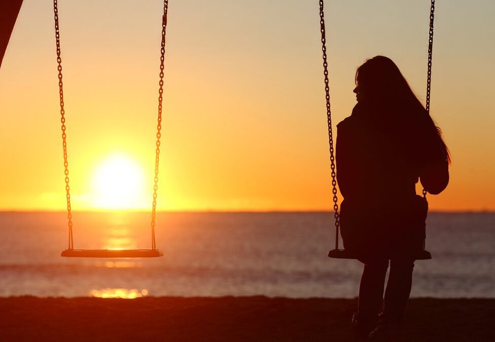 Patient reflecting on loss in solitary session in nature